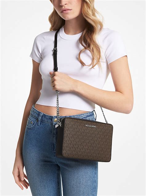 michael kors lg ew crossbody oyster|Jet Set Large Logo Crossbody Bag .